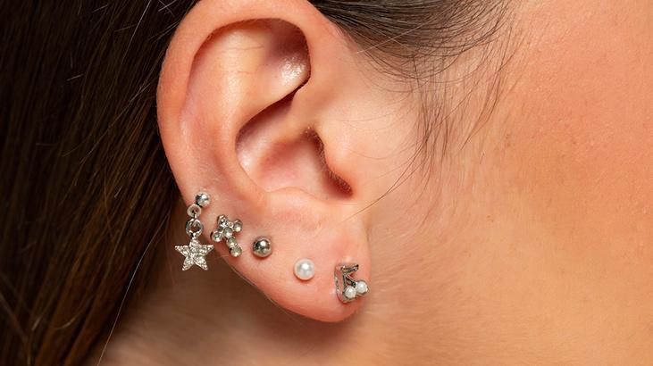 enfeksiyon ve isitme kaybi riski coklu piercing tehlikesi kulak memesini bile yirtiyor dniGSftN.jpg